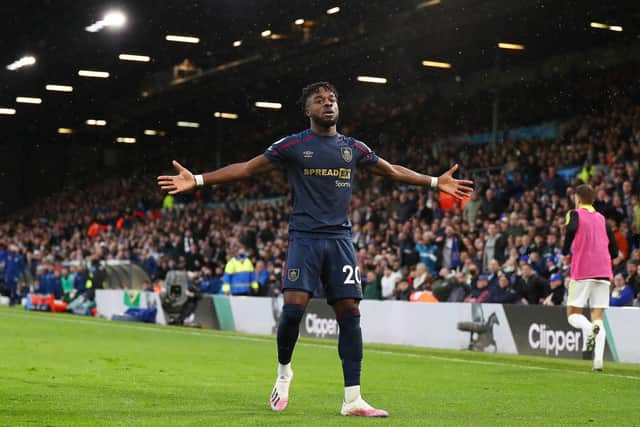 Maxwel Cornet of Burnley celebrates after scoring their sides first goal during the Premier League match between Leeds United and Burnley at Elland Road on January 02, 2022 in Leeds, England.
