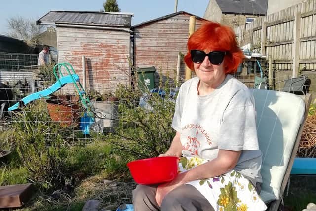Pictured is Garden Club committee member Lesley on her allotment