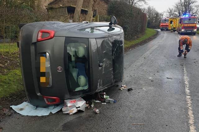 Vehicle flipped onto its side due to icy conditions. Photo credit: Ribble Valley Police