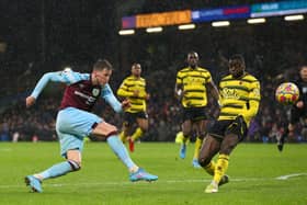 Wout Weghorst of Burnley takes a shot during the Premier League match between Burnley and Watford at Turf Moor on February 05, 2022 in Burnley, England.