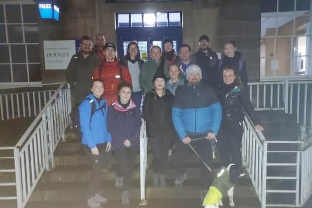 The police officers at the start of their 30 mile walk outside Burnley police station at 6am