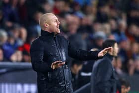 Sean Dyche, Manager of Burnley gestures during the Premier League match between Burnley and Manchester United at Turf Moor on February 08, 2022 in Burnley, England.