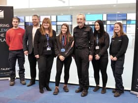 Burnley MP Antony Higginbotham with AMS Neve founder Mark Crabtree and students at Burnley College