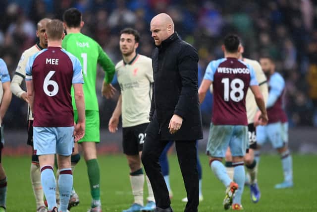 Sean Dyche, Manager of Burnley looks on after the Premier League match between Burnley and Liverpool at Turf Moor on February 13, 2022 in Burnley, England.