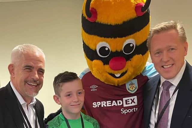 Deacon with club chairman Alan Pace (left) mascot Bertie Bee and Russell Ball