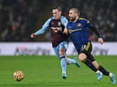 Burnley's Welsh defender Connor Roberts (L) vies with Manchester United's English defender Luke Shaw (R) during the English Premier League football match between Burnley and Manchester United at Turf Moor in Burnley, north west England on February 8, 2022.