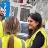 Labour leader Sir Keir Starmer and Shadow Levelling up Secretary Lisa Nandy chat to a worker at What More