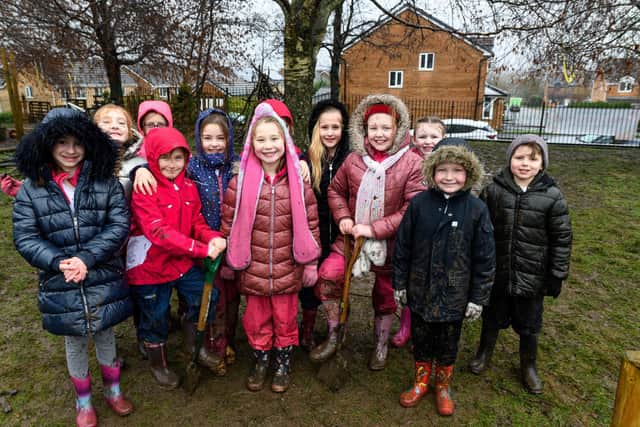 Students at Wellfield Primary School in Burnley get ready to begin their mission to plant 140 trees in the school grounds