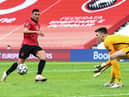 England's goalkeeper Nick Pope (R) gestures to catch the ball past Albania's forward Myrto Uzuni during the FIFA World Cup Qatar 2022 qualification Group I football match between Albania and England at the Air Albania Stadium, in Tirana on March 28, 2021