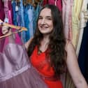 Jennifer Donaldson shows off some of the dresses which will be on sale at the pop up shop   Photo: Kelvin Stuttard
