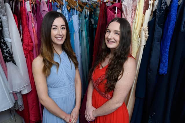 Erin Hughes and Jennifer Donaldson model two of the prom dresses which will be on sale at the hospice Prom Shop at Penwortham Arts Centre   Photo: Kelvin Stuttard