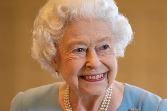 The Queen has tested positive for Covid-19 and is experiencing "mild cold-like symptoms, confirms Buckingham Palace, but expects to continue light duties at Windsor this week. Picture by Joe Giddens. Credit: PA Wire/PA Images