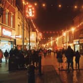 Christmas shopping in Friargate, Preston. This image was captured in 1994. None of the shops you see here are still on the high street today
