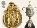 A replica of the first trophy, known as the ‘little tin idol’, which was used from 1896-1910 after the original Cup was stolen. A new trophy (the design still used today) was introduced in 1911.
Pictured beside it, the FA Cup winners’ medal awarded to Bradford City captain Jimmy Speirs in 1911. Speirs scored the only goal in the replay against Newcastle United, which secured a win for the ‘Bantams’.