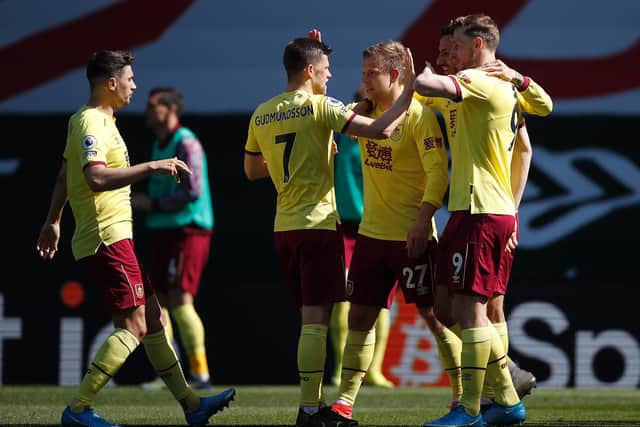 Matej Vydra of Burnley celebrates with teammates after scoring their team's second goal during the Premier League match between Southampton and Burnley at St Mary's Stadium on April 04, 2021 in Southampton, England.