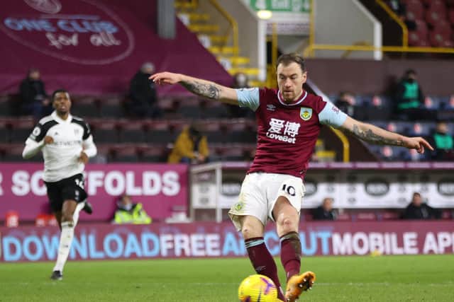 Ashley Barnes of Burnley scores their side's first goal during the Premier League match between Burnley and Fulham at Turf Moor on February 17, 2021 in Burnley, England.