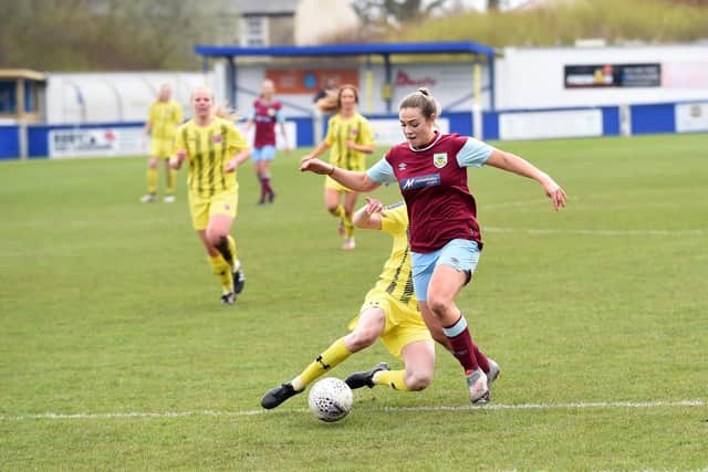 Burnley's Katie Thomas drives into the penalty area