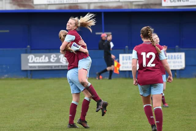 Match-winner Nic Worthington is embraced after netting the winner for Burnley FC Women in their FA Cup tie against Fylde Women FC.