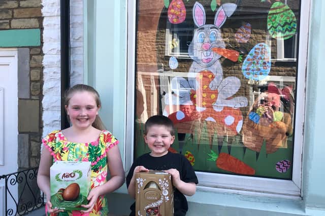 Happy winners of the best decorated Easter themed window