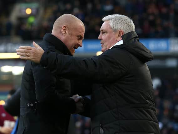 Sean Dyche, Manager of Burnley shakes hands with Steve Bruce, Manager of Newcastle United during the Premier League match between Burnley FC and Newcastle United at Turf Moor on December 14, 2019 in Burnley, United Kingdom.