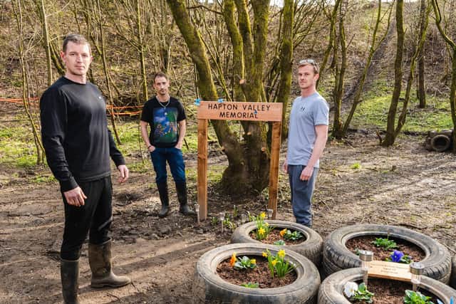 The Northern Monkeys (left to right) Damion Whitton, Chris Kipper Taylor and Bruce-Lee Knowles at the Hapton Pit memorial site they have created