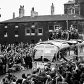 Happy memories. Harry Potts is on this celebration bus as it toured Burnley after the club won the 1959/60 Division One title trophy.