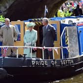 Prince Philip on board the Pride of Sefton on the Leeds and Liverpool Canal in 2012 with Her Majesty the Queen and Prince Charles