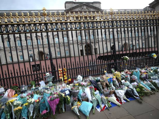 Tributes left at Buckingham Palace (Picture: Press Association)