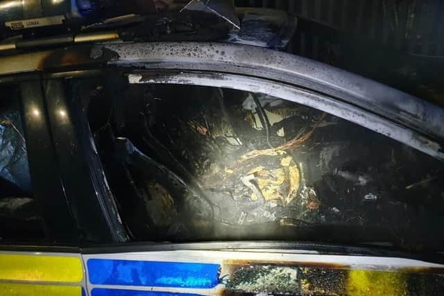 The shocking state of the torched police vehicle