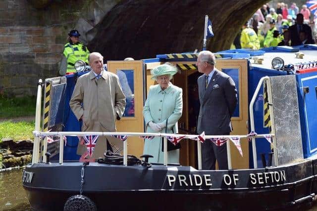 Prince Philip travelling on the Leeds and Liverpool Canal with Her Majesty the Queen and Prince Charles in Burnley in 2012