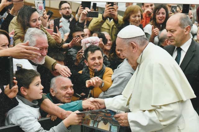 Patrick Fleming (front row, second from left) meeting Pope Francis