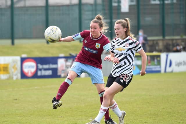 Action from Burnley FC Women's Vitality FA Cup tie against Manchester United Women
