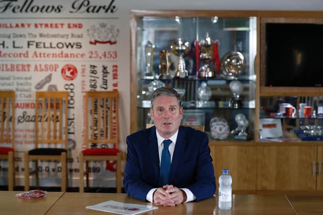 Labour Leader Keir Starmer sits in the board room during a visit of Walsall Football Club on September 19, 2020 in Walsall, England.