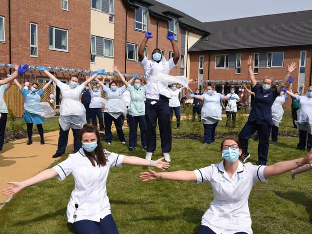 Now we are one - staff at the Sue Ryder Neurological Care Centre in Fulwood, Preston, celebrate their first anniversary                             Photo: Neil Cross