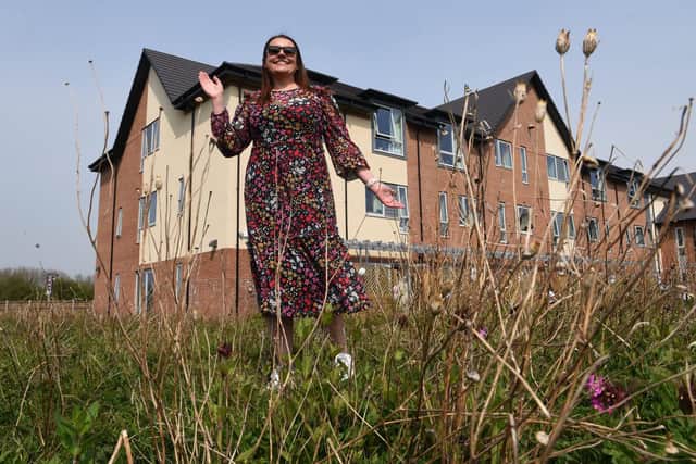 Fundraiser Michelle White pictured in the grounds of the Centre where  it's hoped to create a sensory and wheelchair friendly garden  Photo: Neil Cross