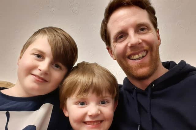 Shaun, with his sons Charlie and Joseph, has pledged to raise £1M for Pendleside Hospice