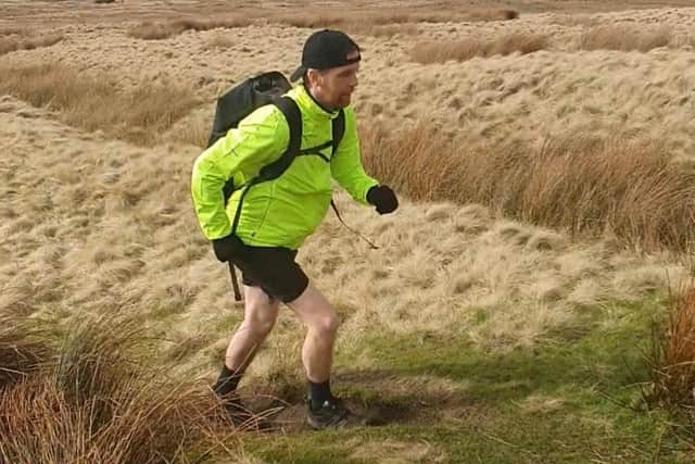 Shaun pictured hard at work in training around Pendle Hill