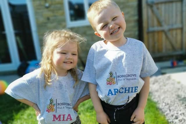 Fruit loving Archie and Mia Gorton are the poster kids for their parents new greengrocers' shop in Burnley