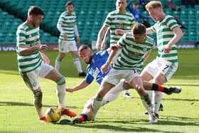 Rangers striker Kemar Roofe is crowded out by the Celtic defence during the Ladbrokes Scottish Premiership match between Celtic and Rangers at Celtic Park on March 21, 2021 in Glasgow, Scotland.