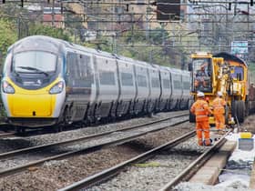 A train passes engineering work on the West Coast main line. Rail passengers are being warned of disruption on the line this May bank holiday weekend. Picture courtesy Network Rail