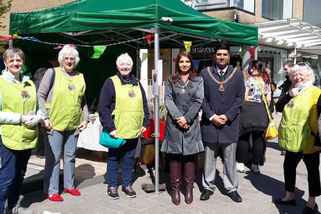 The Mayor and Mayoress of Burnley Coun. Wajid Khan and his wife Anam, arrive ay the 'pop up' shop organised by members of the Mayoress's fundraising committee.