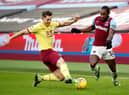 West Ham United's English midfielder Michail Antonio (R) vies with Burnley's English defender James Tarkowski during the English Premier League football match between West Ham United and Burnley at The London Stadium, in east London on January 16, 2021.