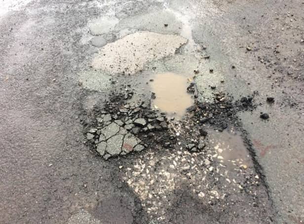 A section of crumbling carriageway on Daffodil Close in Helmshore (image: Dave Carter)