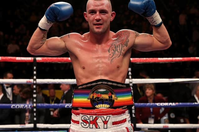 Super-middleweight boxer Luke Blackledge proudly parades his Commonwealth strap