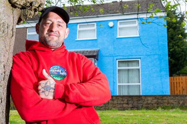Scott Pickles painted his house blue in a bid to help people struggling with their mental wellbeing to think what they can do to make them feel more positive