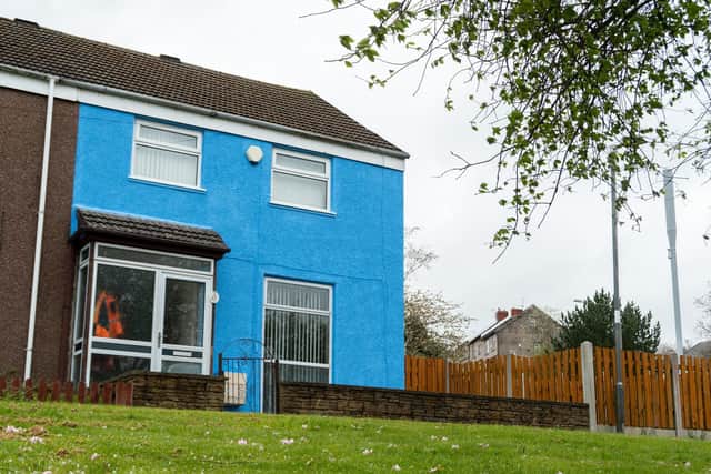 Scott's house really stands out from the crowd now