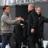 Scott Parker, Manager of Fulham interacts with Sean Dyche, Manager of Burnley prior to the Premier League match between Fulham and Burnley at Craven Cottage on May 10, 2021 in London, England.