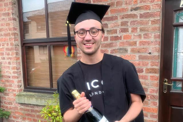 Jack celebrates his graduation at home during lockdown