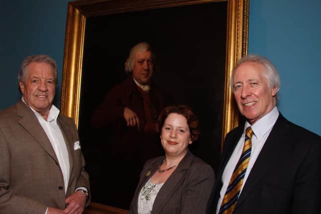 Hilary pictured in 2012 in  front of the portrait of Sir Richard Arkwright