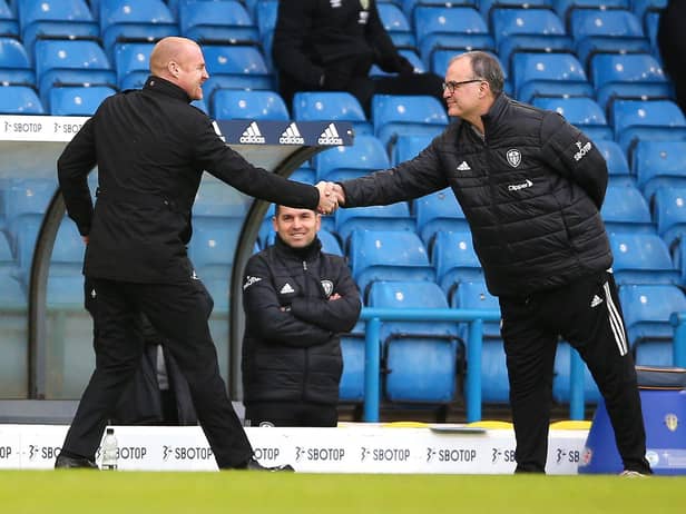 Sean Dyche, Manager of Burnley shakes hands with Marcelo Bielsa, Manager of Leeds United prior to the Premier League match between Leeds United and Burnley at Elland Road on December 27, 2020 in Leeds, England.